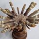 Antique sea urchin pencil on turned wooden base, 22 cm
