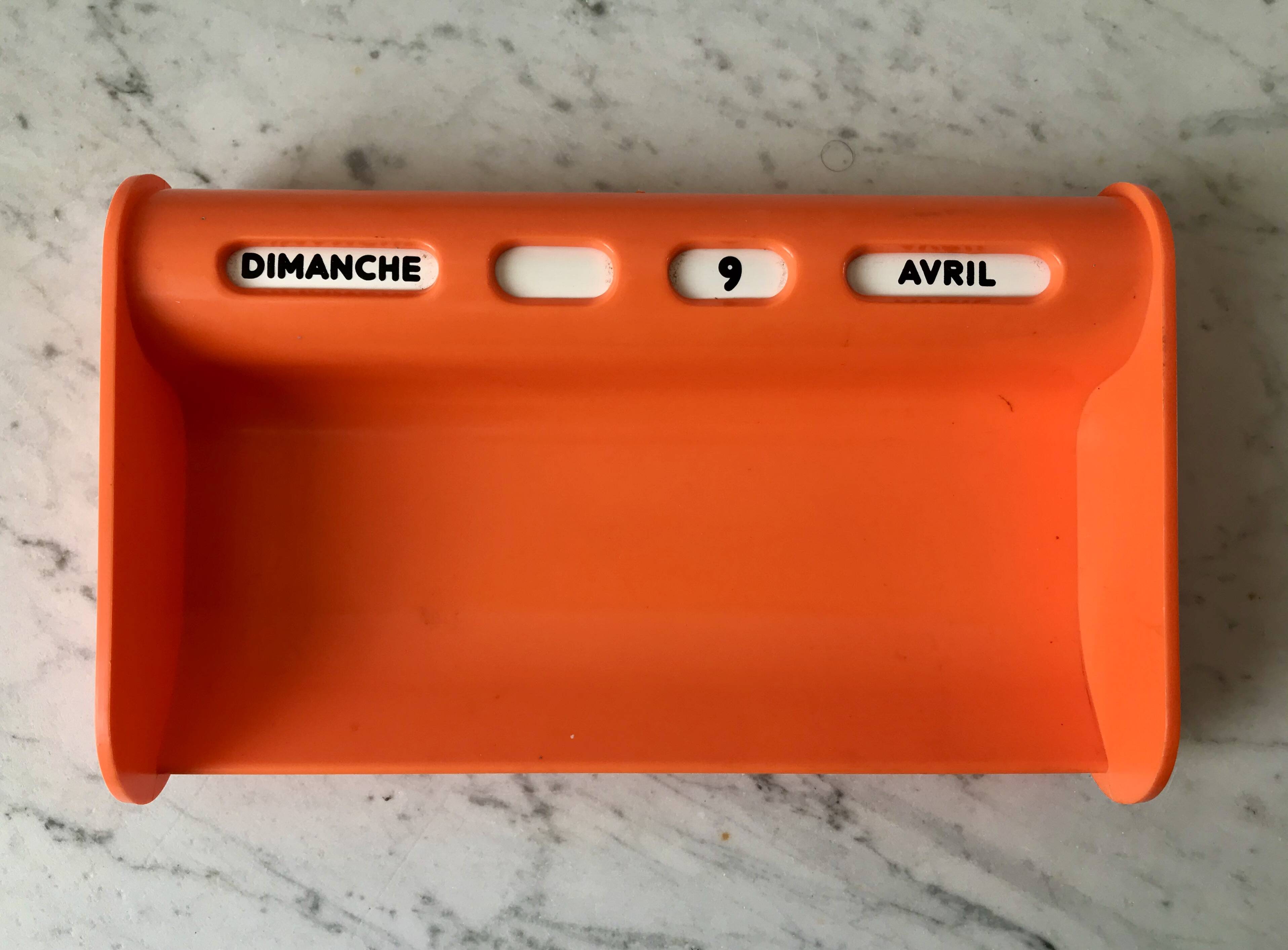 Dater empty pocket in orange plastic seventies 70s