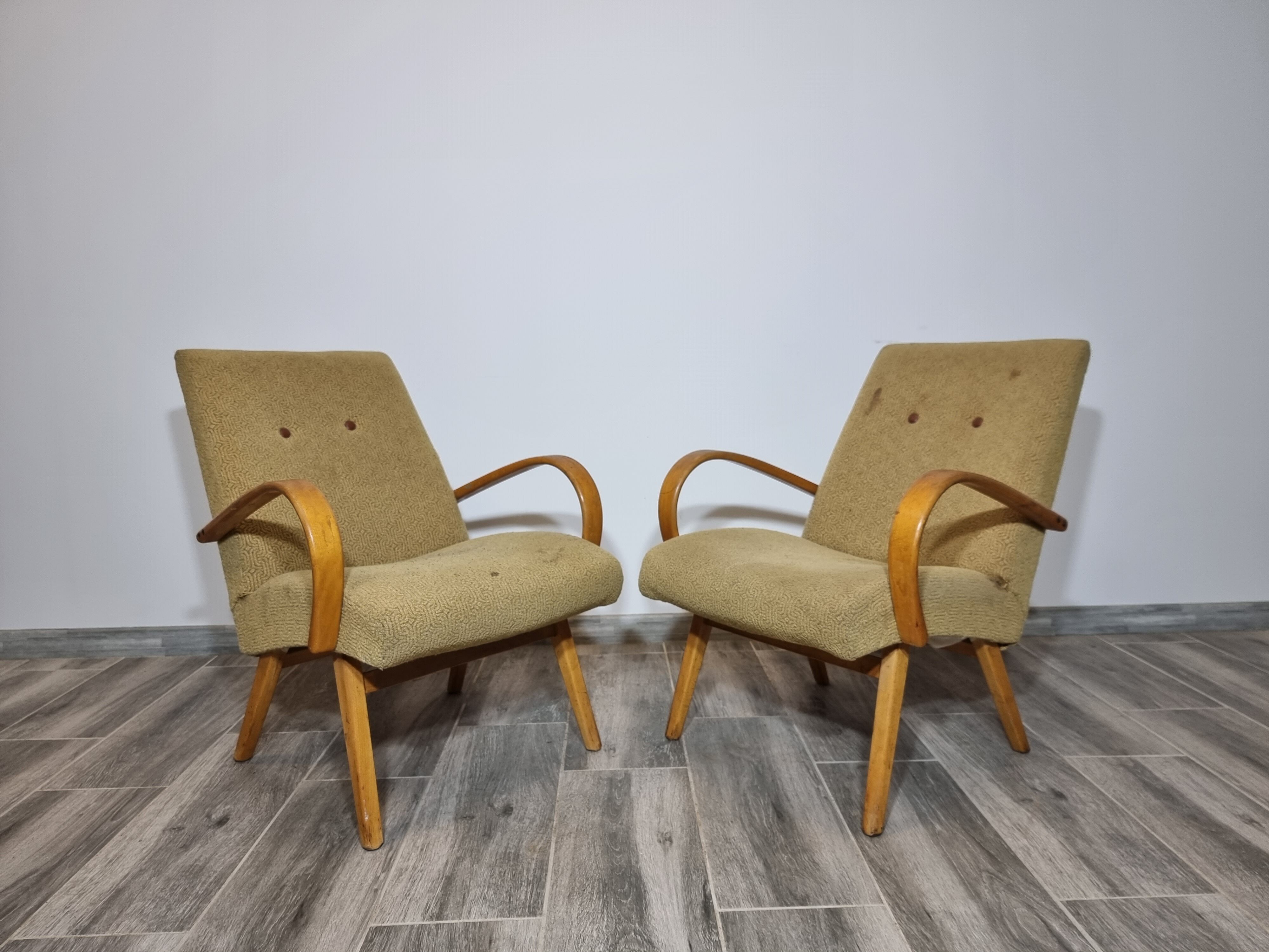 Armchairs by Jaroslav Smidek