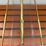 80s Plexiglas and brass magazine rack