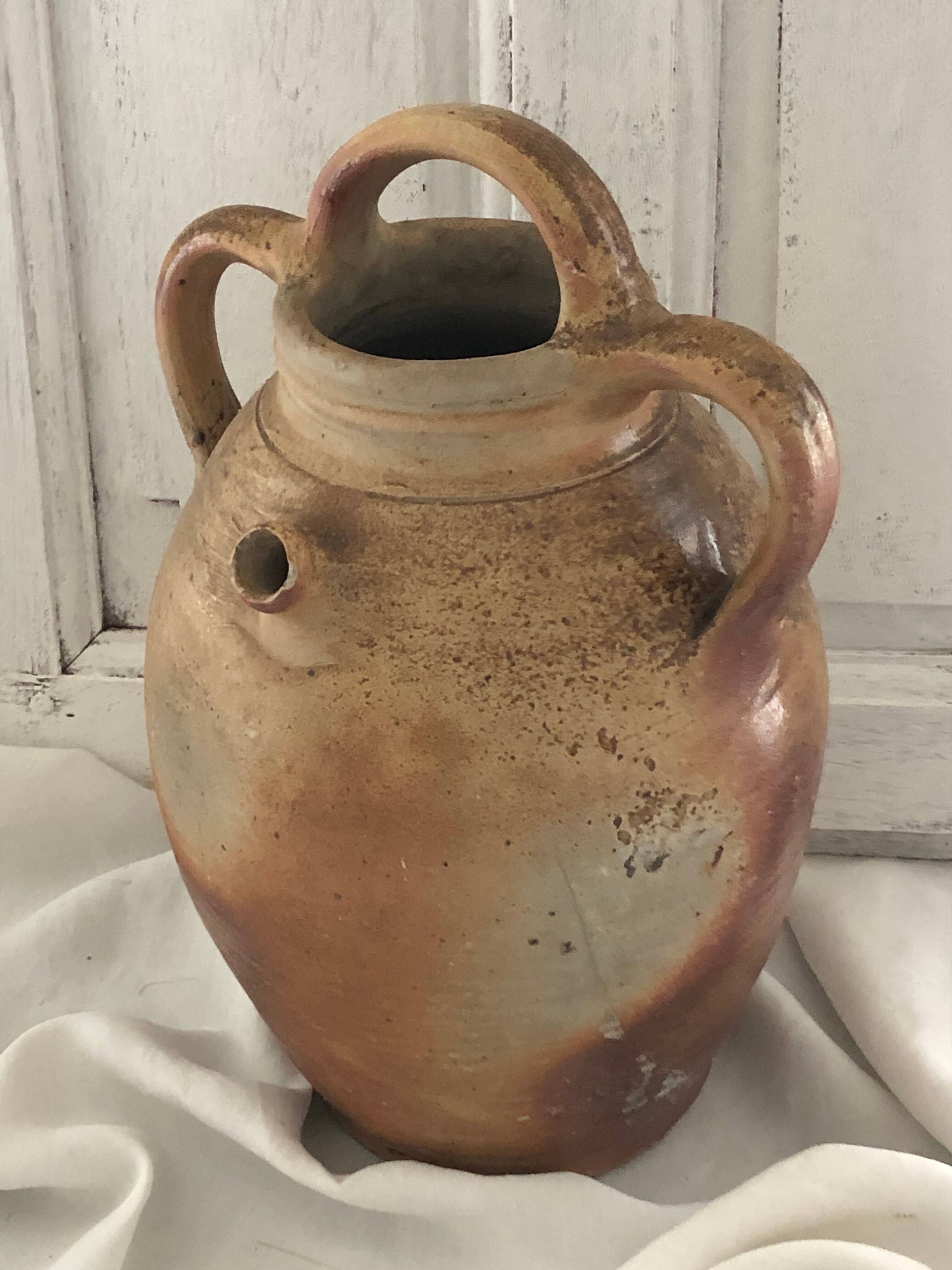Old jar, gargoulette, kid jug