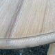 Renovated Louis Philippe round extendable dining table with 4 leaves.