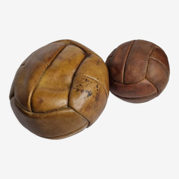 Set of two vintage leather medicine balls, 50s-60s