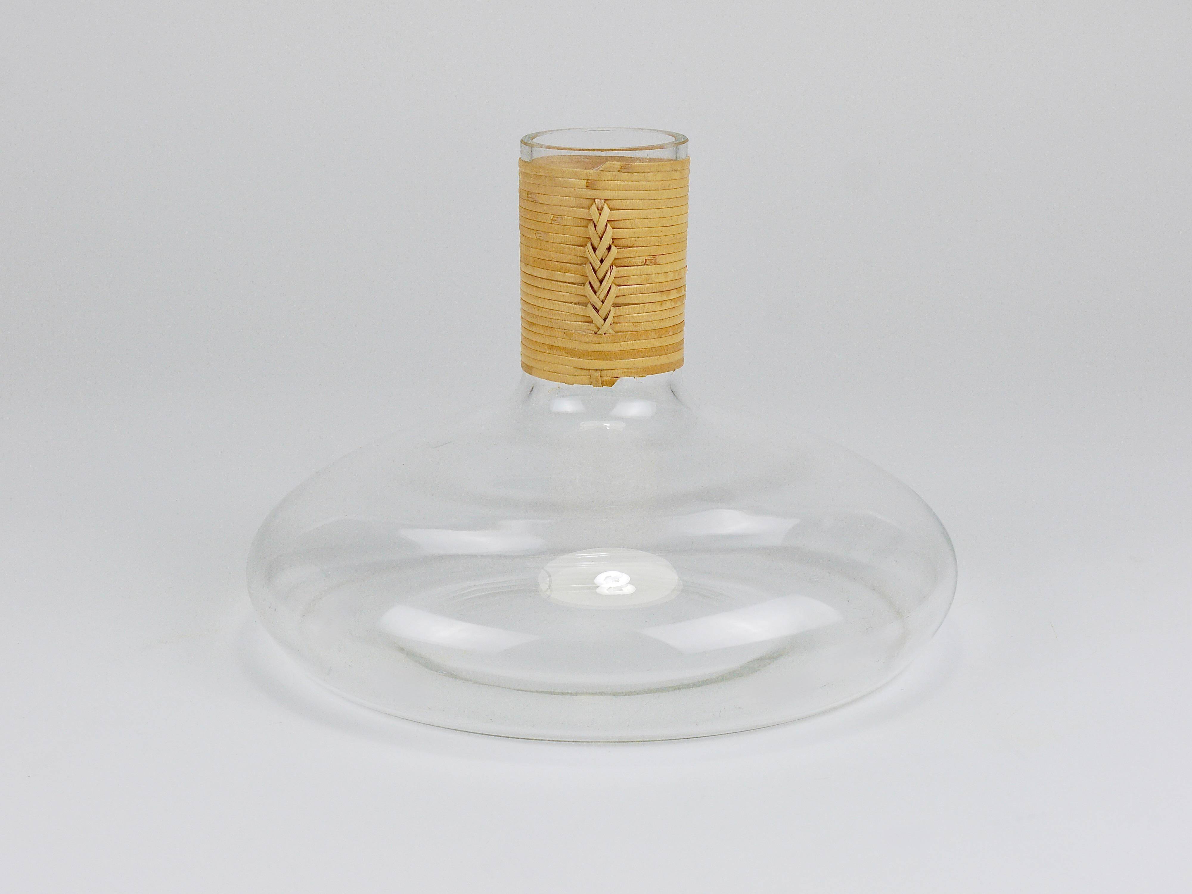 Vase by Carl Auböck decanter "Tuberkulinkolben" tall in rattan, Austria, 1950s.