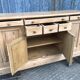 Scandinavian natural pine sideboard with 4 doors and 6 drawers.