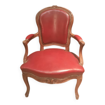 Louis XV period armchair covered in leather.