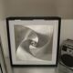 a Kinetic Op Art Aluchromy under glass frame.