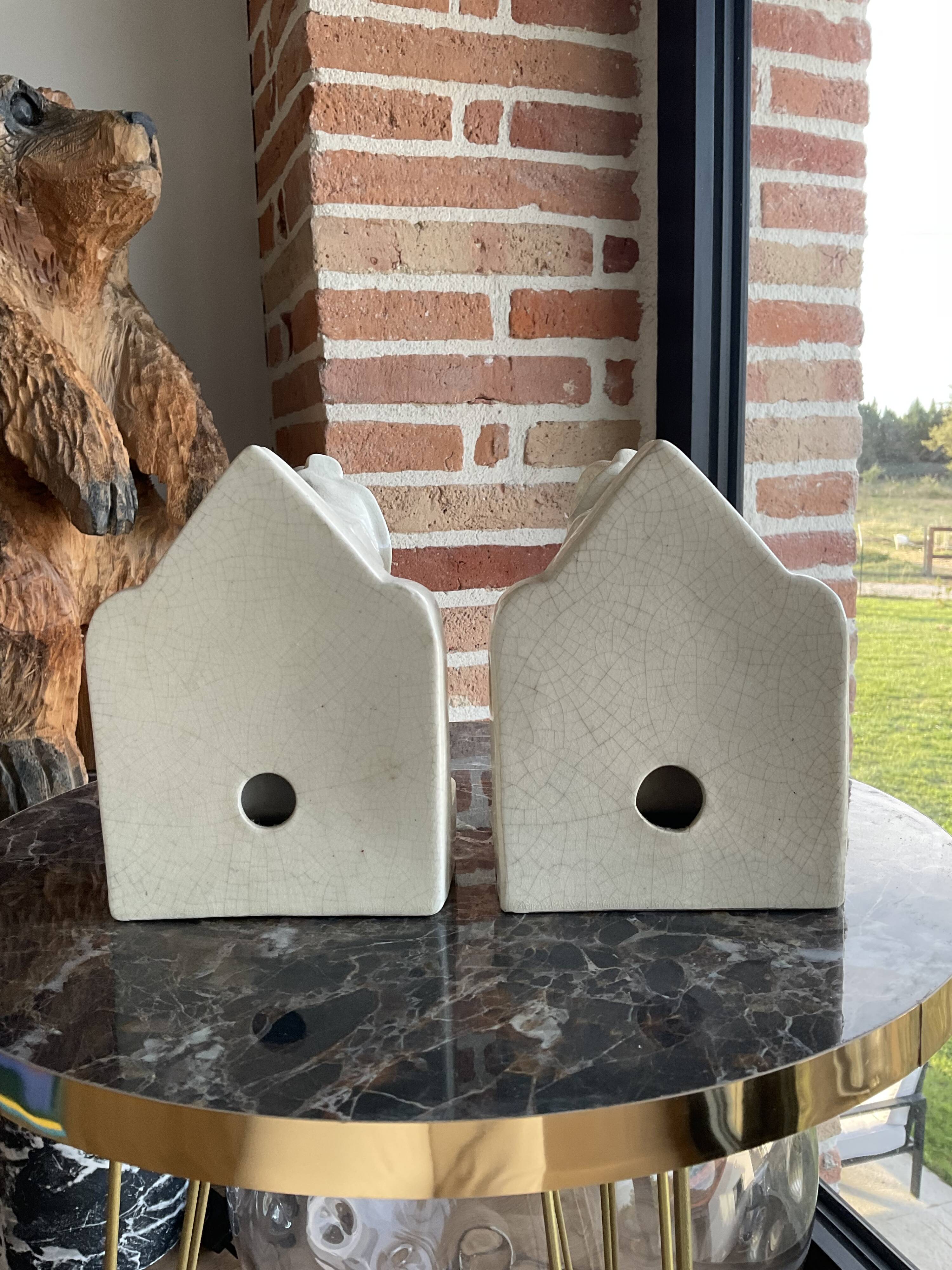 Pair of cracked earthenware bookends. ART DECO