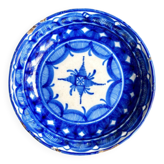 Round hollow dish in blue glazed terracotta