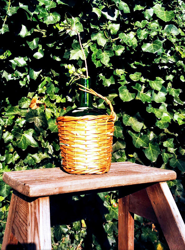 Demijohn dressed in wicker