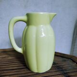 Yellow pitcher in earthenware