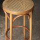 Beautiful curved blond wood caned stool. 1940s/1950s.