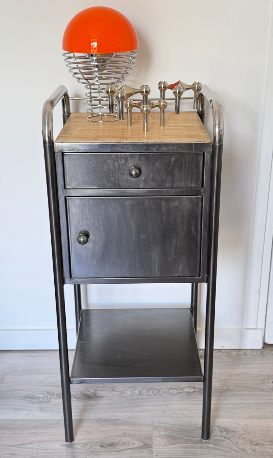 Vintage bedside table in brushed metal