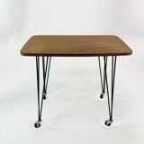 Table on wheels, laminate top and metal Eiffel legs, circa 1950