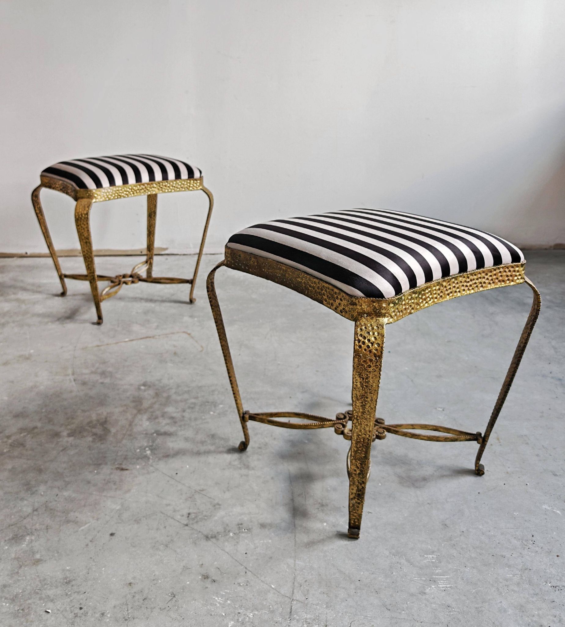Pair of Mid Century Modern ottomans by Pier Luigi Colli from the 1950s.