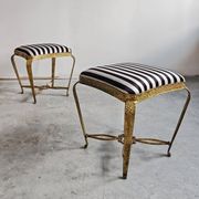 Pair of Mid Century Modern ottomans by Pier Luigi Colli from the 1950s.