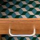 Vintage desk compass feet 1950 and its Baumann chair