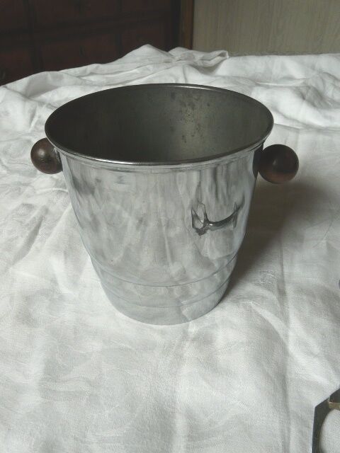 Ice in chromed metal and macassar ebony and pliers bucket