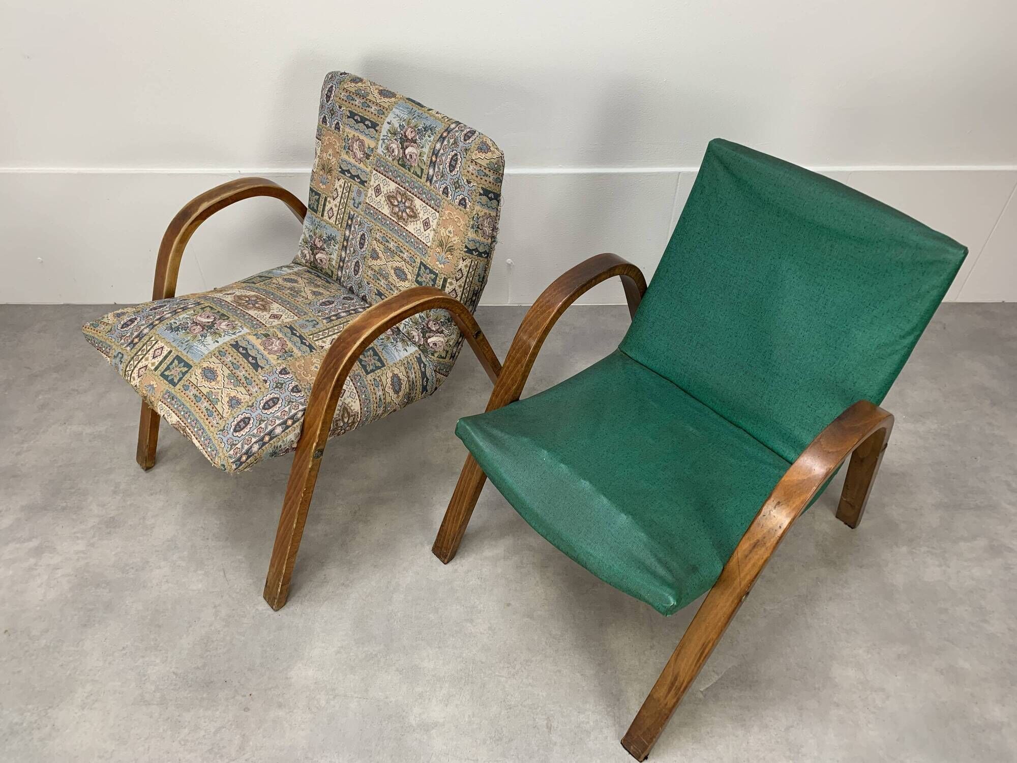 Pair of Bow Wood Hugues Steiner armchairs for Baumann