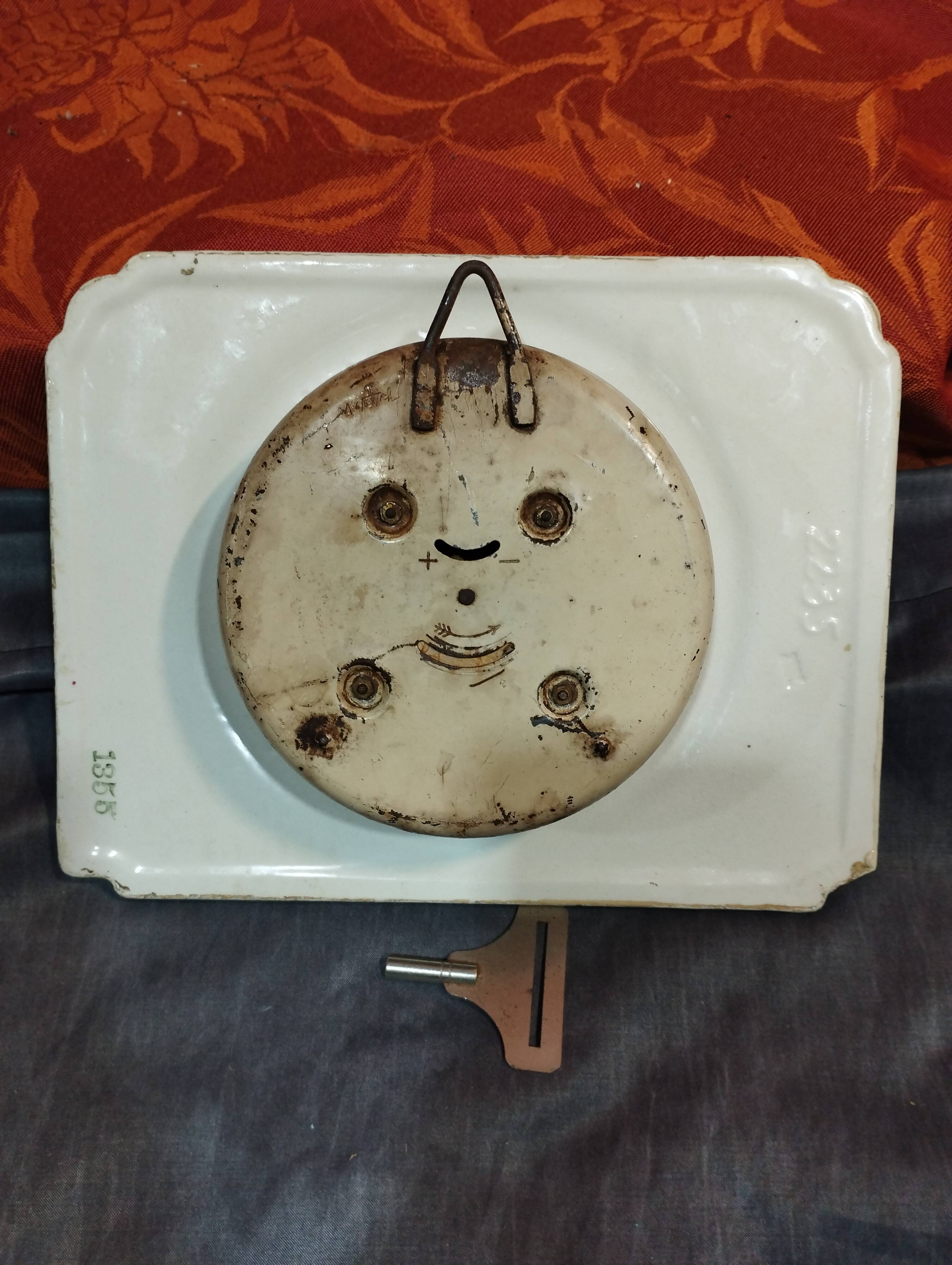 Small white art deco earthenware wall clock