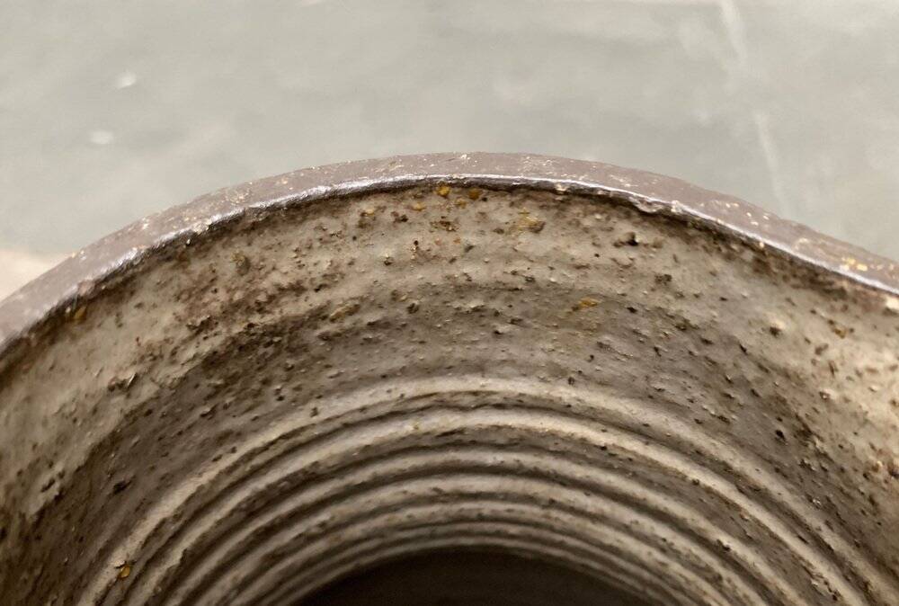 Brutalist German vase on a mid-century stand by Krösselbach Keramik, 1960s.