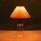 Minimalist glass table lamp from the 80s with a pleated shade.