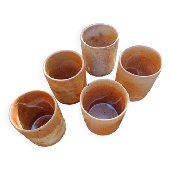 Set of 5 stoneware mugs.