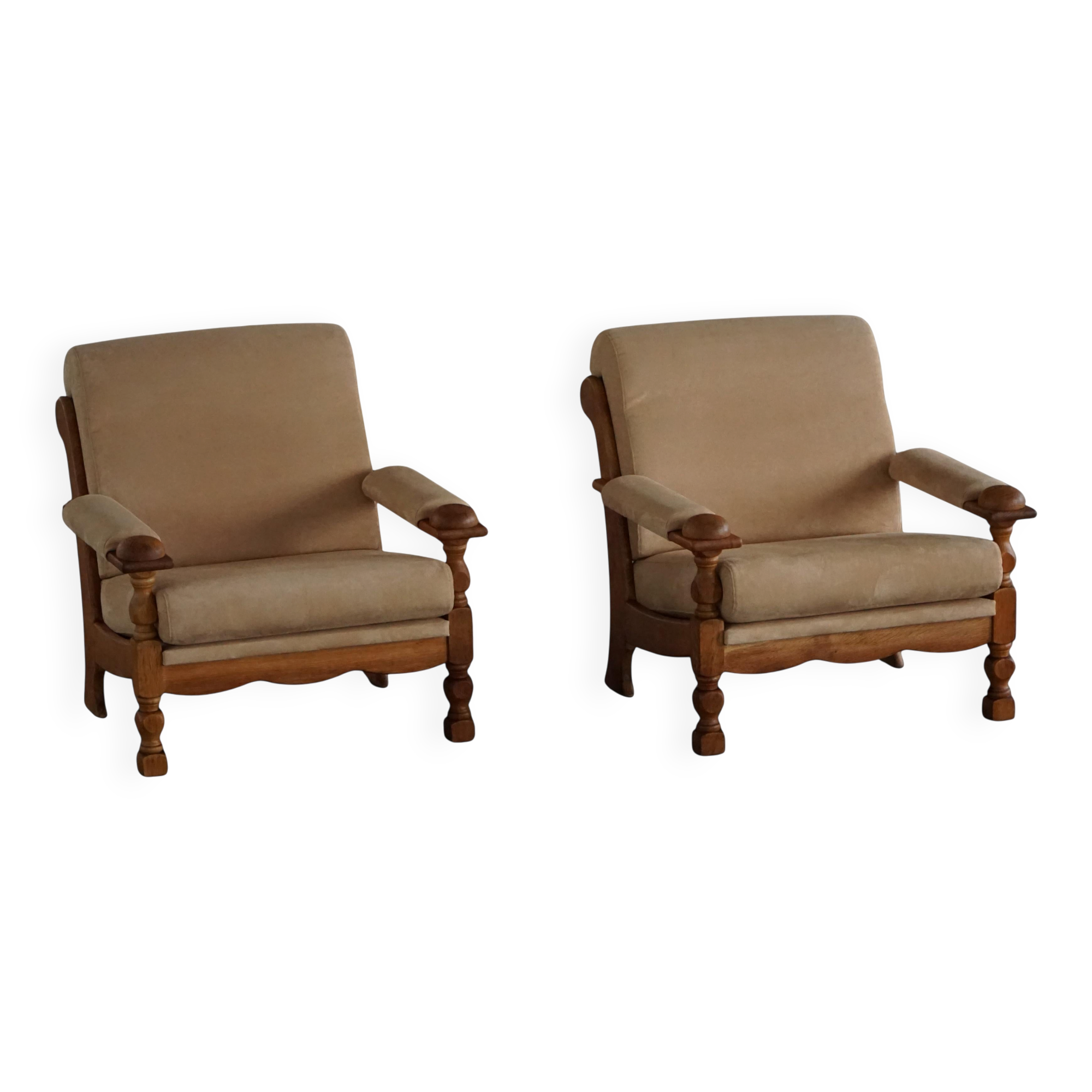 Pair of armchairs by Henning Kjærnulf, Oak Oak and Alcantara, mid-20th century, 1960s.