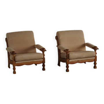 Pair of armchairs by Henning Kjærnulf, Oak Oak and Alcantara, mid-20th century, 1960s.