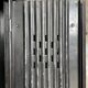 Strafor double-door corrugated iron cloakroom, circa 1920.
