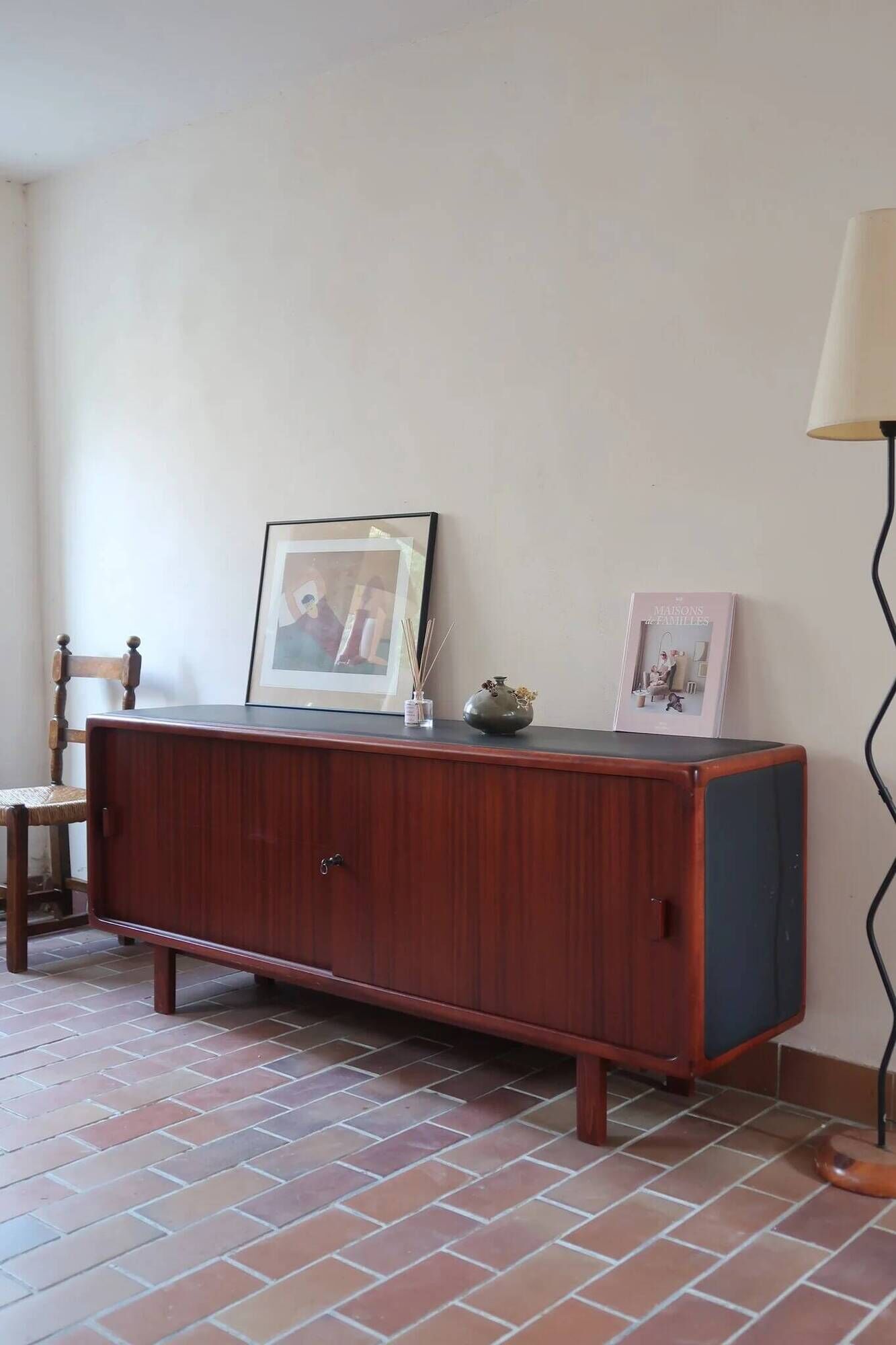 Teak enfilade, sliding doors, black faux leather top, 1970s.
