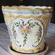 Earthenware cachepot, hand-decorated with floral motifs and scrolls