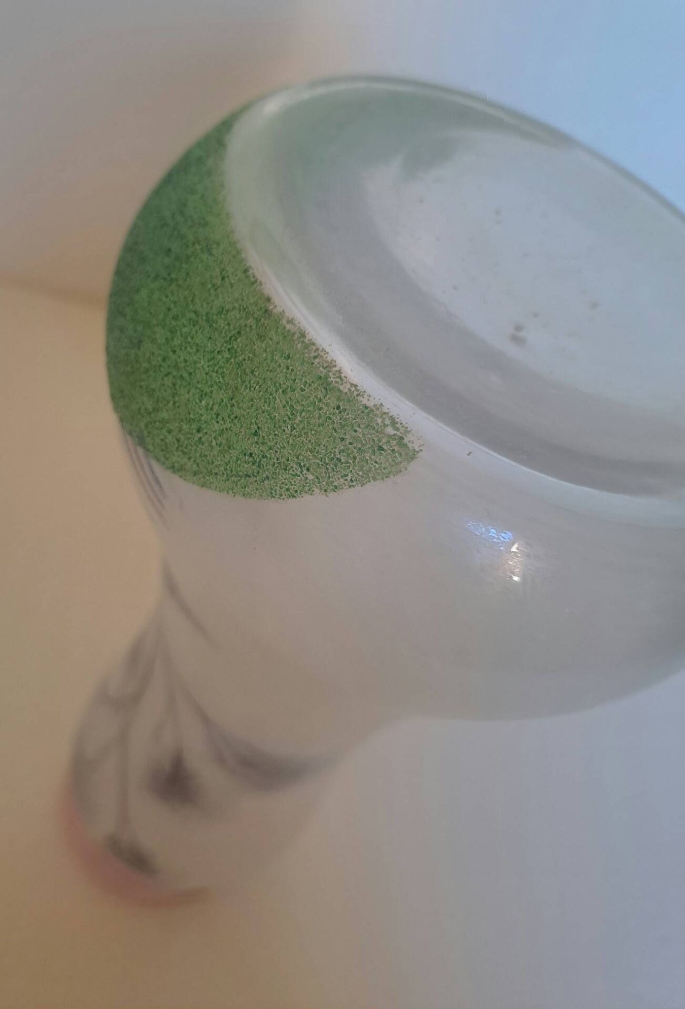 Frosted glass vase enhanced by hand