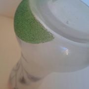 Frosted glass vase enhanced by hand