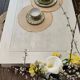 Exotic wood coffee table with its safety glass protection.