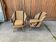 Pair of Mid-Century brown armchairs in beech and upholstery fabric, 1950s.
