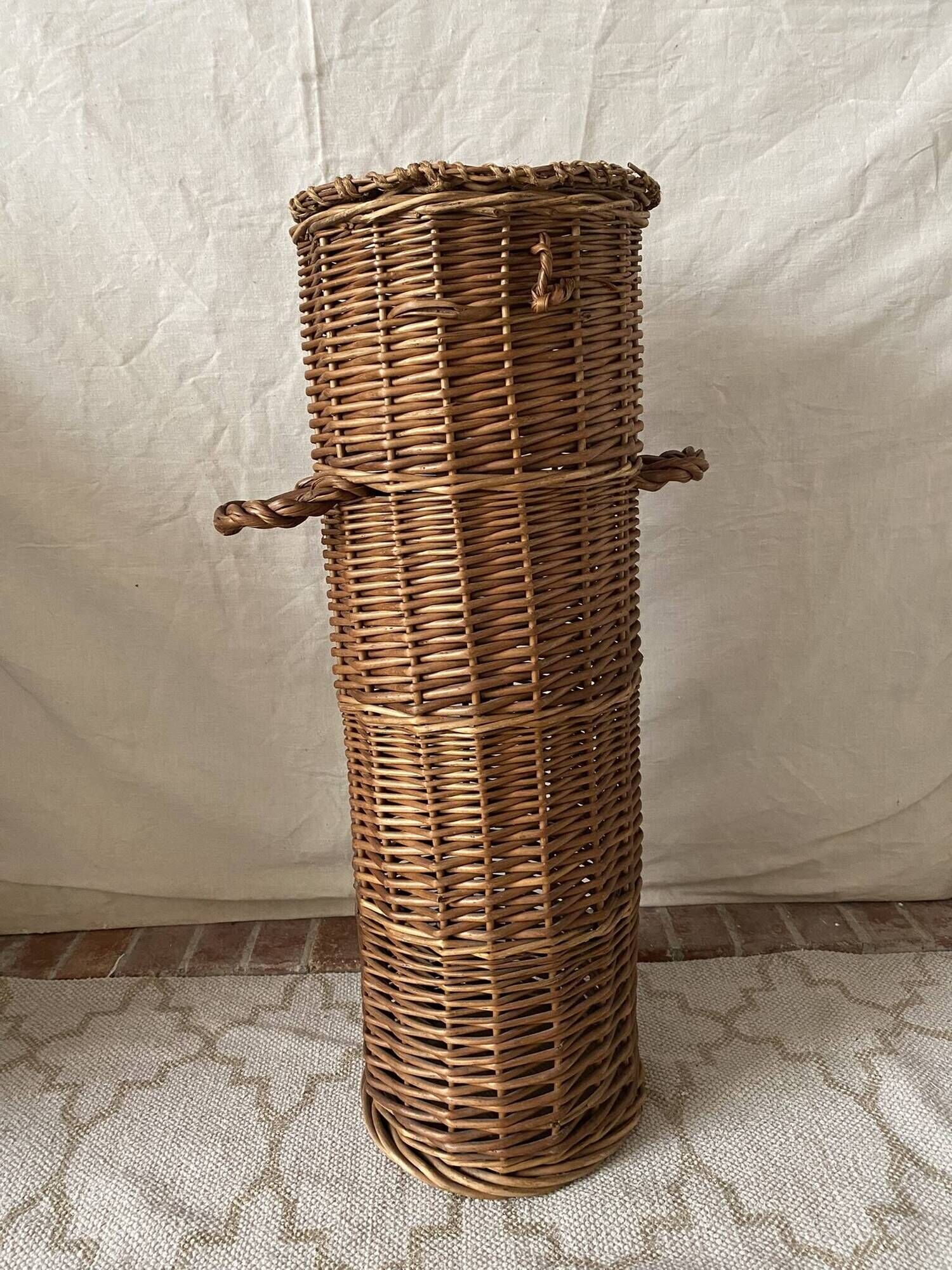 Woven wicker basket, vintage rod holder