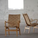 Pair of Swedish armchairs from the mid-century by Bruno Mathsson, model "Eva", 1960s.