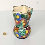 Multicolored Vallauris vase in polychrome earthenware with bas-relief decoration of colored flowers