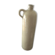 Old stoneware bottle with ear, loop