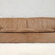 Cinna sofa. Circa 1970. Foam and "caramel" leather. 3 seats.