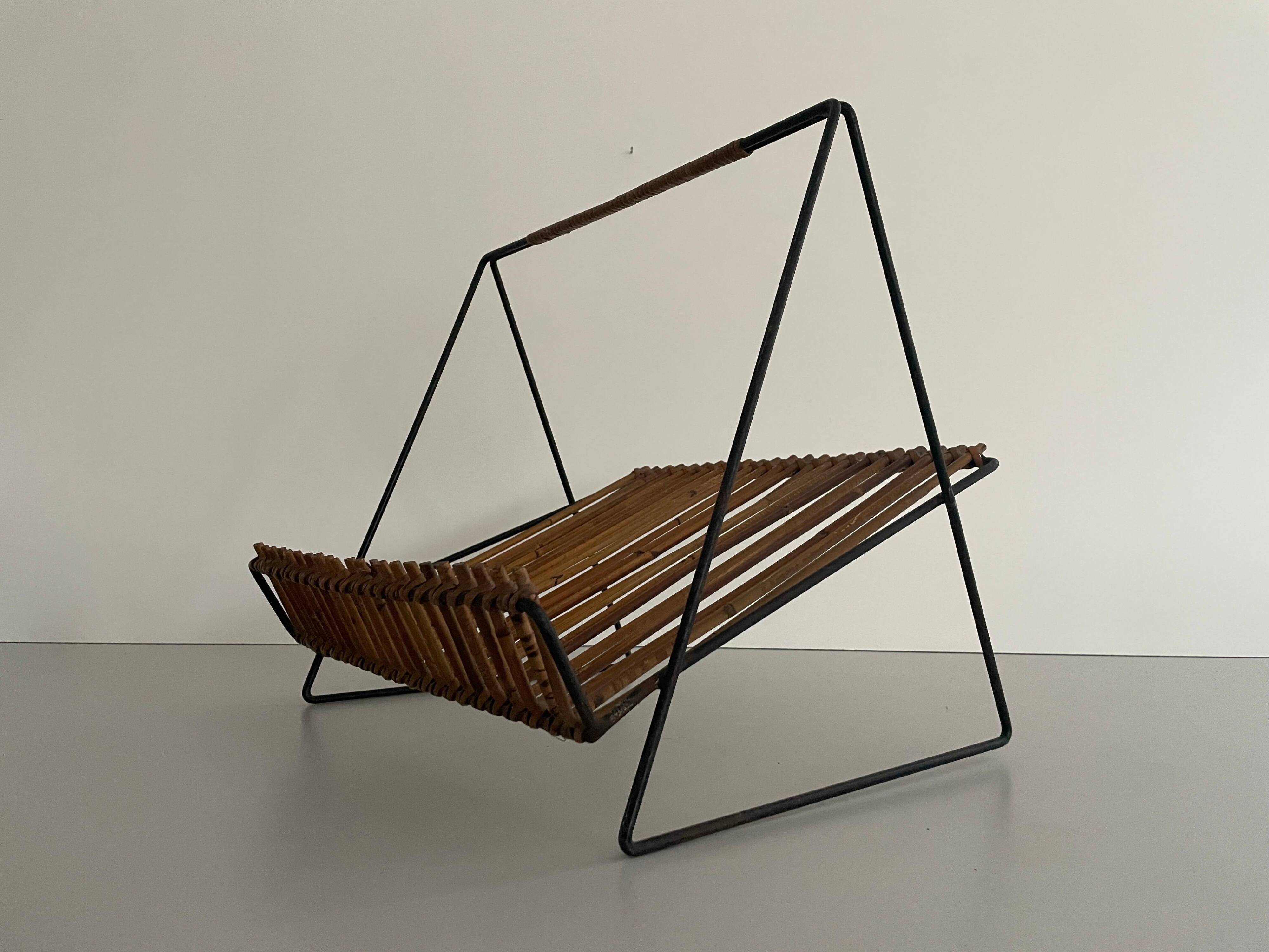 Mid-century black metal and rattan magazine rack, 1960, Italy