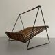 Mid-century black metal and rattan magazine rack, 1960, Italy