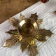Pair of candlesticks, holly leaves, in brass