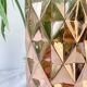 Vintage glass vase with geometric pattern in rose gold gradient