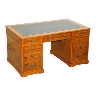 Partner desk in burr walnut designed to conceal computer equipment.