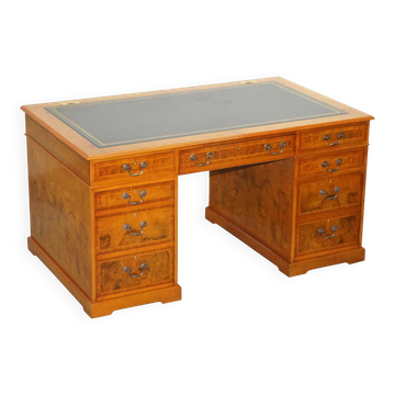 Partner desk in burr walnut designed to conceal computer equipment.