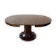 Round, extendable dining table