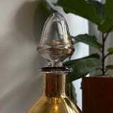 Amber crystal decanter and golden details