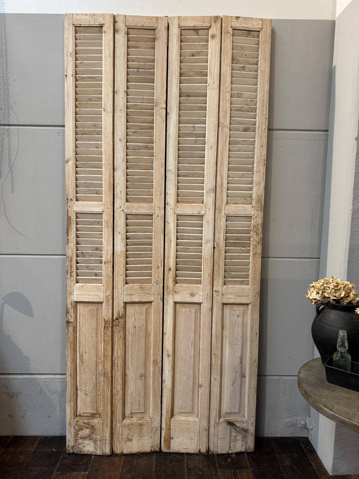 Old folding shutters with louvers
